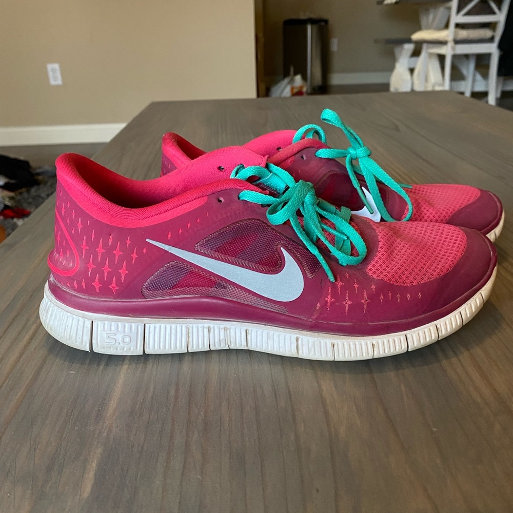Pink and teal Nikes.